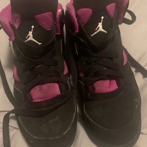 Black and purple Jordan’s